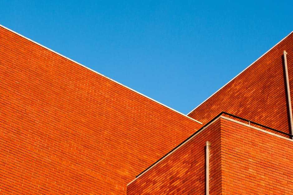 Going Flat: The Pros and Cons of Flat Roofs in Commercial Buildings