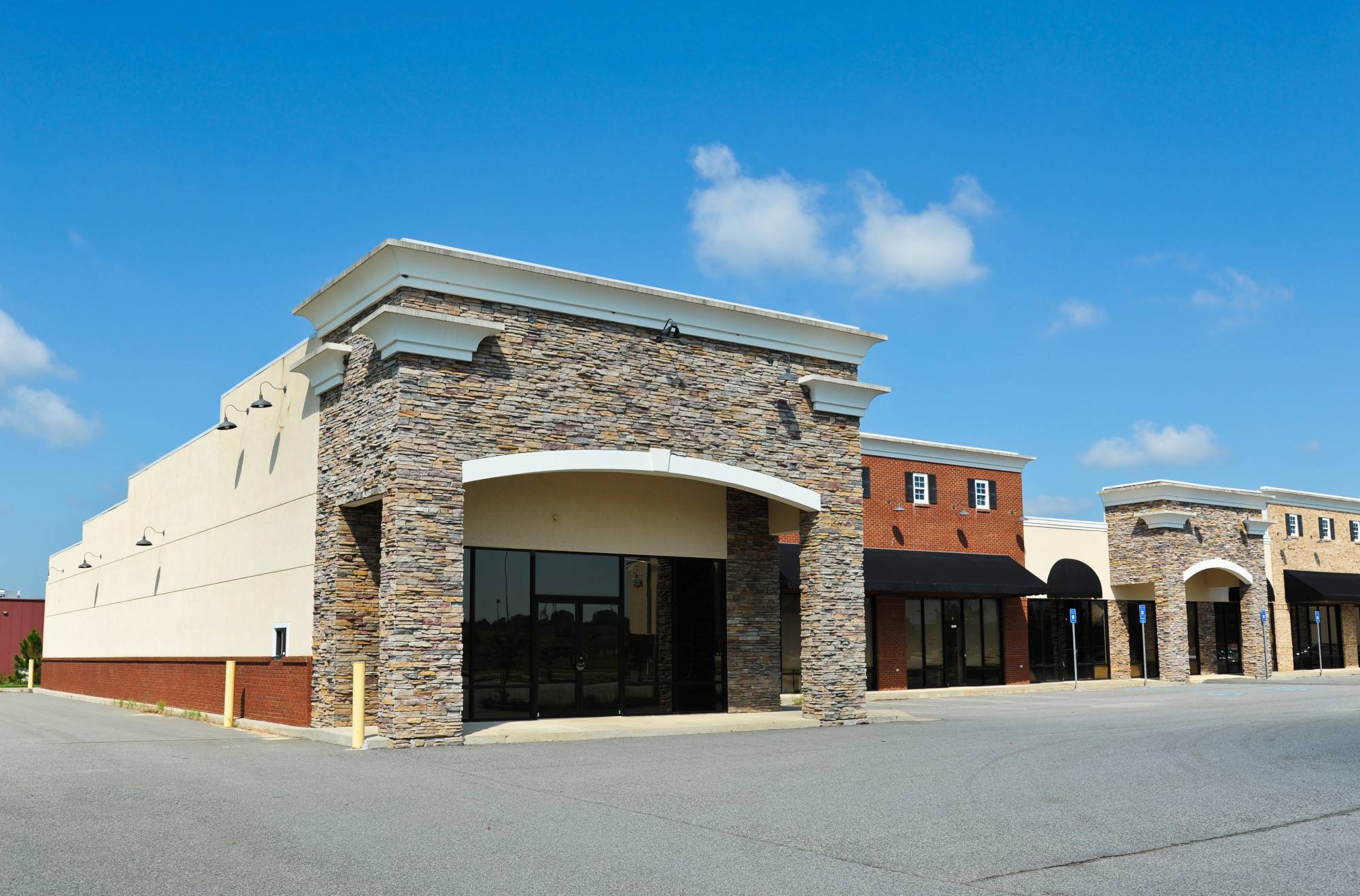 Three Warning Signs That Indicate Your Building Needs a Roof Replacement